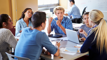 High school students working together at a table